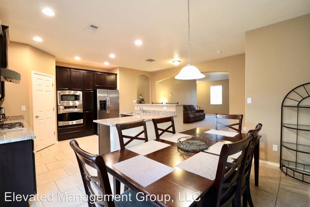 Foto principal - 5 br, 2 bath House - 9619 Stormcloud NW