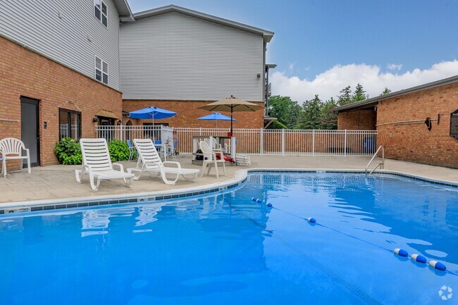 Building Photo - London Square and Blue Spruce