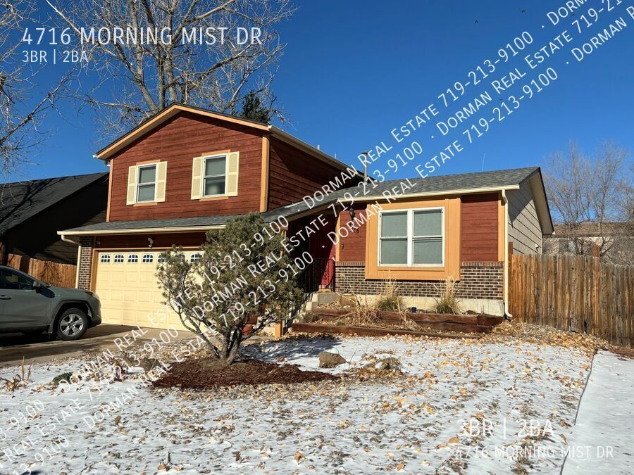 Primary Photo - Tri-level home with two car garage, air co...