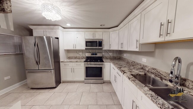 Building Photo - 4810 S Langley Ave