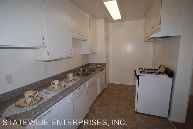 Building Photo - 8427-8437 Tobias Ave