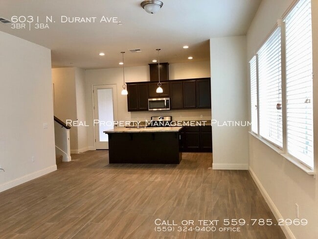 Foto del edificio - 6031 N Durant Ave