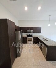 Building Photo - 9219 N Gower Ave