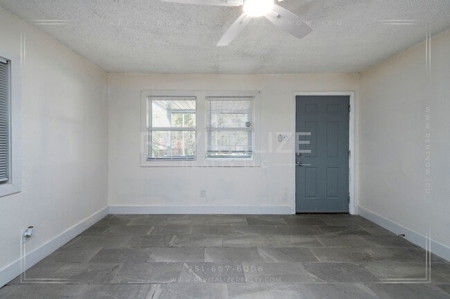 Building Photo - 3 BR 2 BA Home with Fenced Yard & Carport