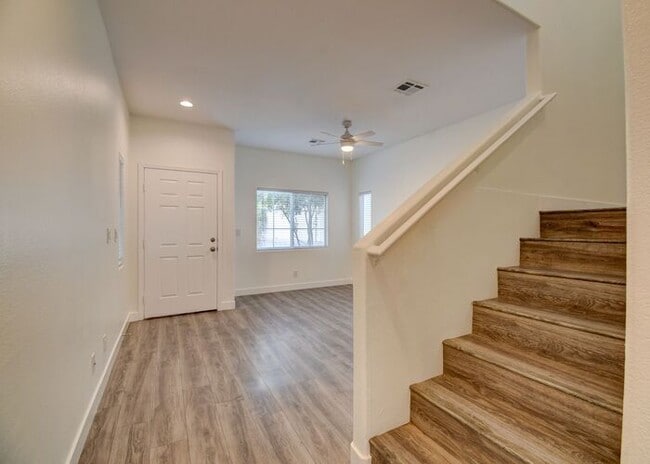 Building Photo - Great home with 4 bedrooms, 2.5 baths. New Floors Paint and Countertops.