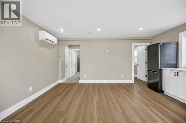 Building Photo - 1466 Main St E