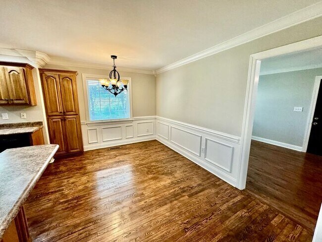 Building Photo - Home available in popular area