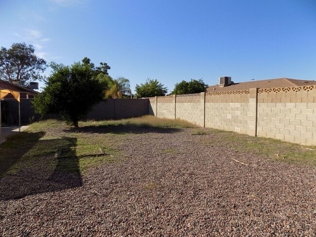 Building Photo - 6440 E Julep St