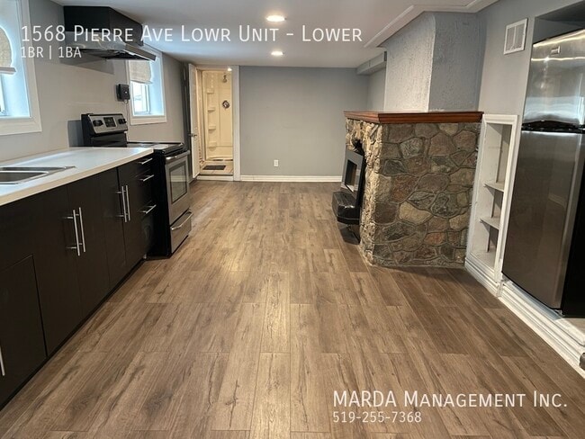 Photo du bâtiment - COZY 1 BED/ 1BATH BASEMENT UNIT - WALKERVILLE PLUS HYDRO!