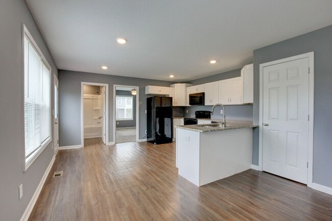 Building Photo - Two Story Duplex With Hardwood Flooring an...