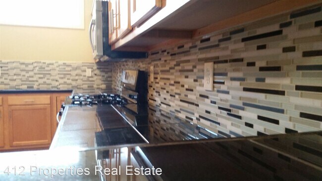 Foto del edificio - 4 br, 2 bath House - 151 Pius Street