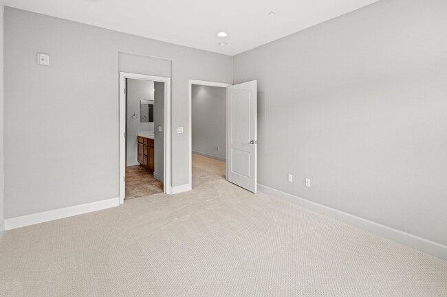 Building Photo - TOSCANA TOWNHOME EMBRACES LUXURY LIVING PRIVACY | SECURITY | MANY UPGRADES