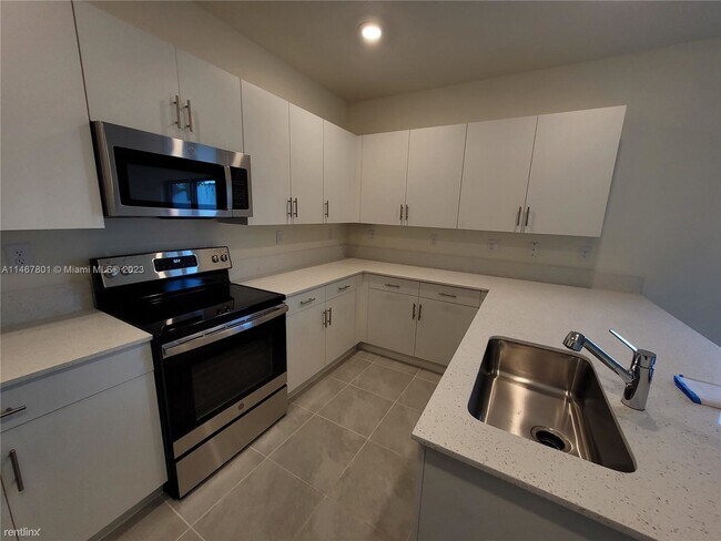 Building Photo - 3 br, 2.5 bath House - 11446 W 33rd Way