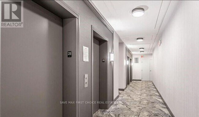 Photo du bâtiment - 80 Absolute Ave