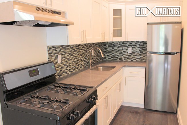 Foto del edificio - 406 Tompkins Ave