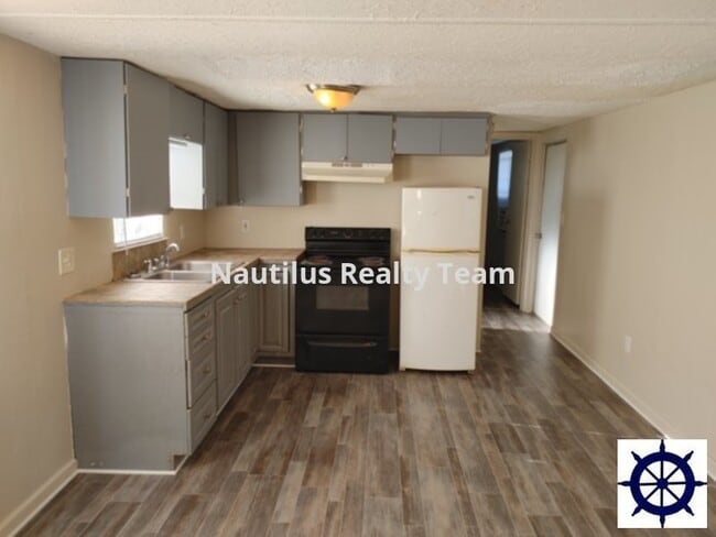 Foto del edificio - 5115 E 14th St