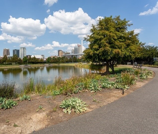 The Railroad Park Lake Path provides great views of the city skyline