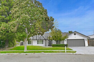 Building Photo - 7721 N Cedar Ave