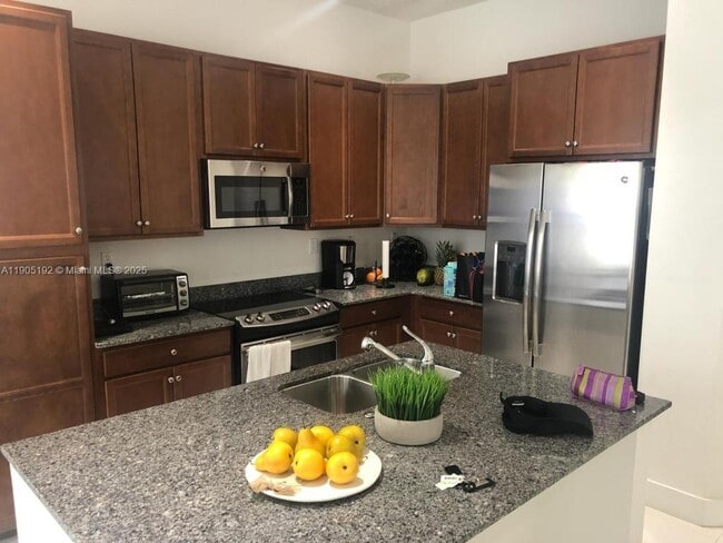 Building Photo - 9824 W 34th Ct