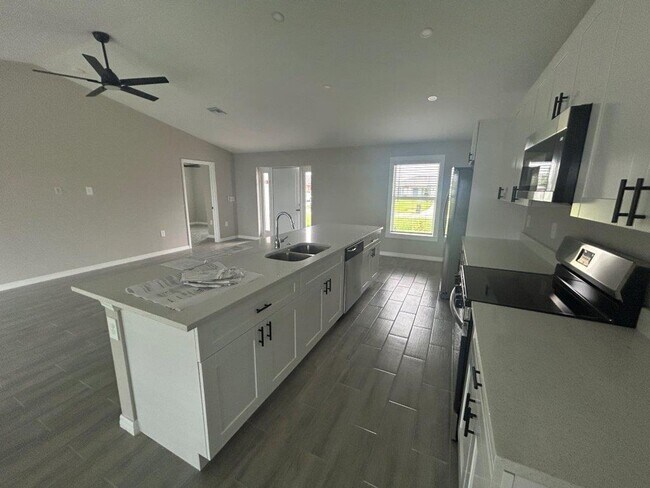 Building Photo - $1000 OFF THE FIRST MONTHS RENT: Available Now!! Brand New Construction 4/3
