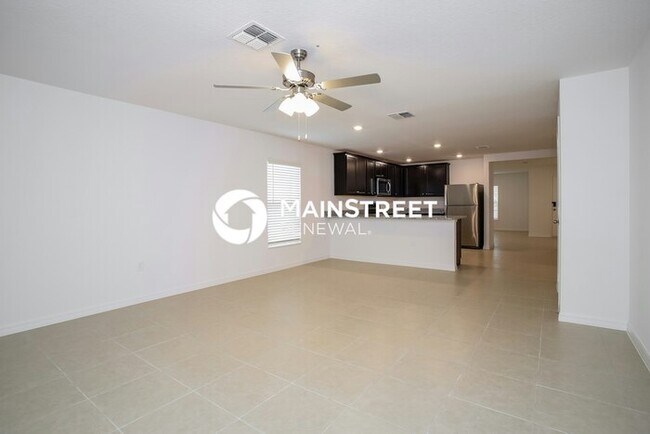 Building Photo - 4 Bedroom Pet-Friendly Home in Mascotte, FL with Main Street Renewal