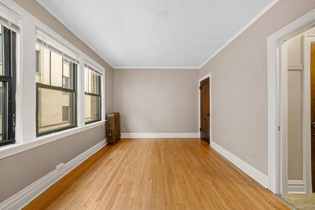 Building Photo - Sunny, Convertible Studio with Two Rooms a...