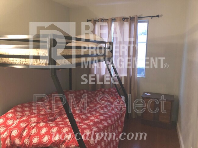 Foto del edificio - 8712 Woodman Way