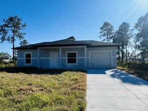 Building Photo - 1106 Capri St E