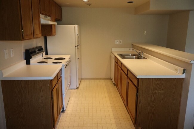 Building Photo - Comfortable Condo Near CSU