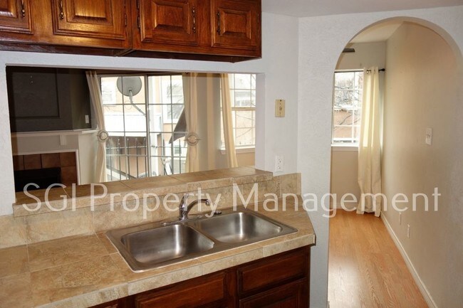 Building Photo - 1 BR condominium community with secured, a...