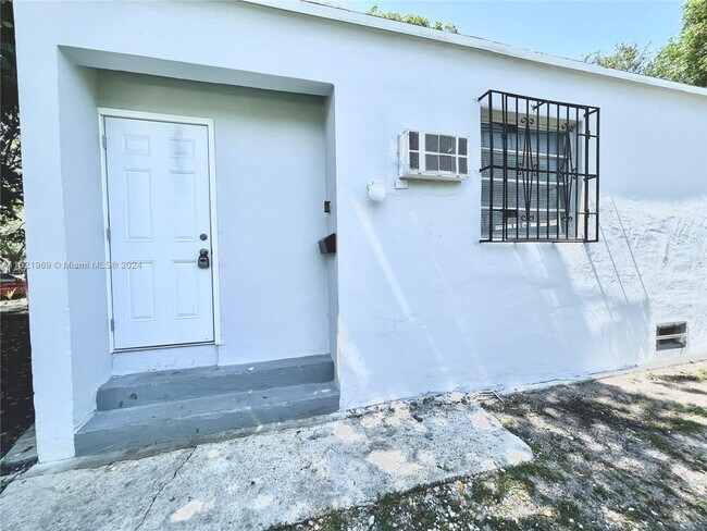 Building Photo - 7009 NW 5th Ave