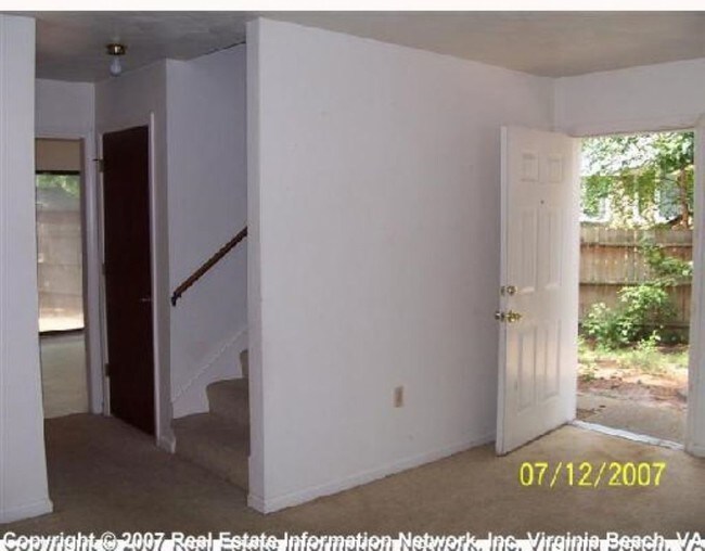 Building Photo - 233 Whispering Pines Court Apt A - 1