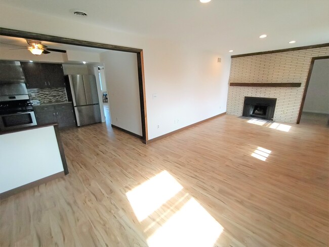 Living Room w new flooring - 18 W Union Ave