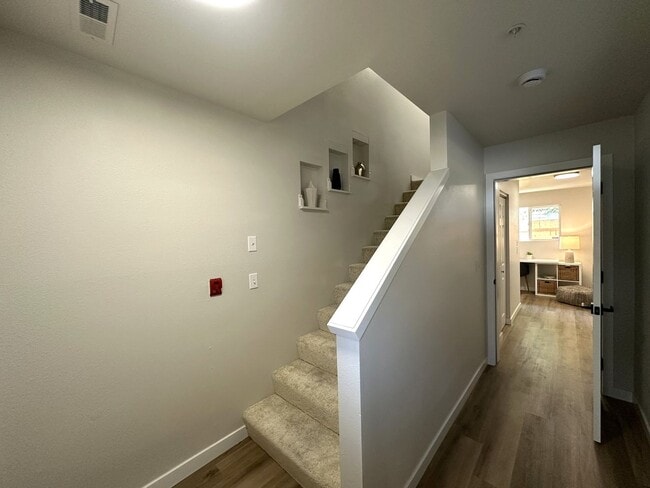 Building Photo - Updated 3-Story Condo with Balconies in So...