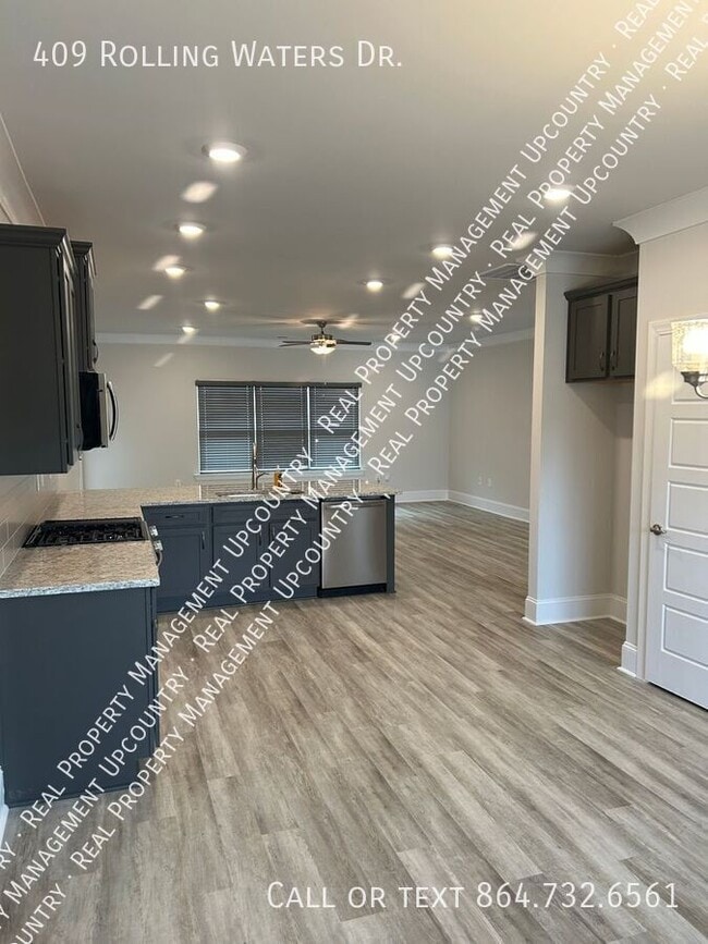 Foto del edificio - 409 Rolling Waters Dr