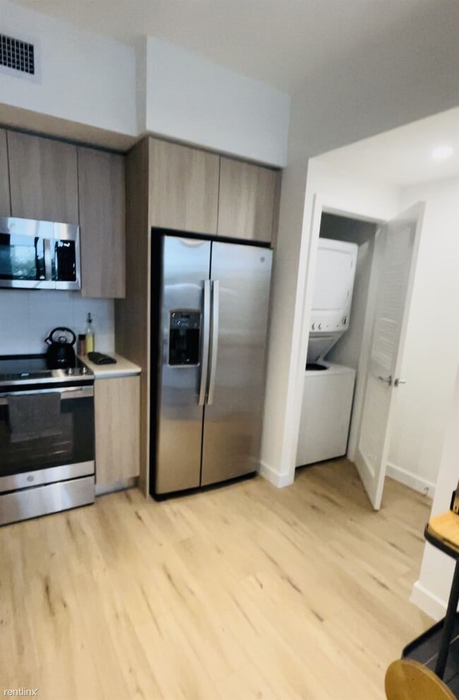 Building Photo - 3 br, 2 bath Condo - 4646 Palm Ave NUEVO C...