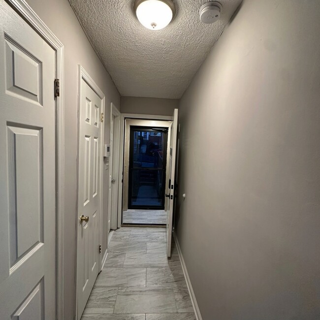 Hallway/Entryway- View 1 - 5422 67th Ave Townhome