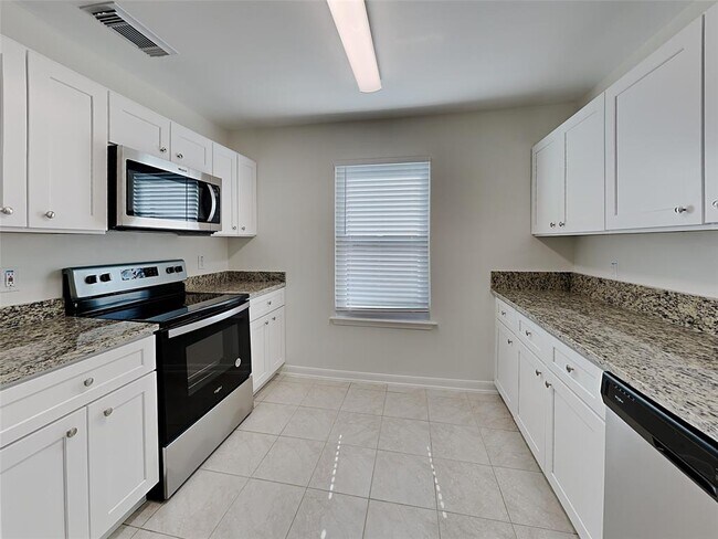 Building Photo - 11731 Rolling Stream Dr