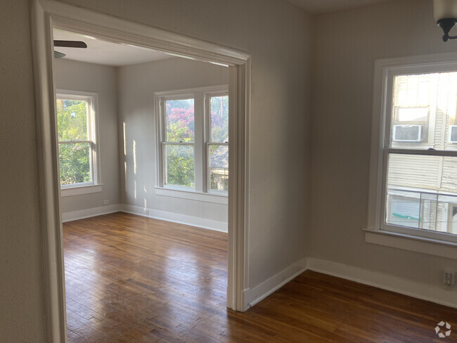 Spacious living room and dining area with loads of natural light - 266 Post Ave