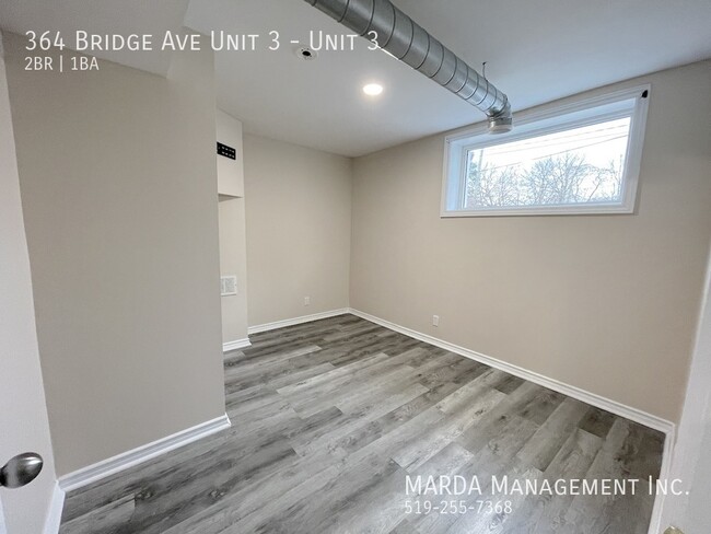 Building Photo - UPDATED 2-BEDROOM/1-BATH MAIN FLOOR UNIT-I...