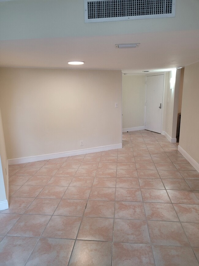 Dining and living room - 20400 W Country Club Dr