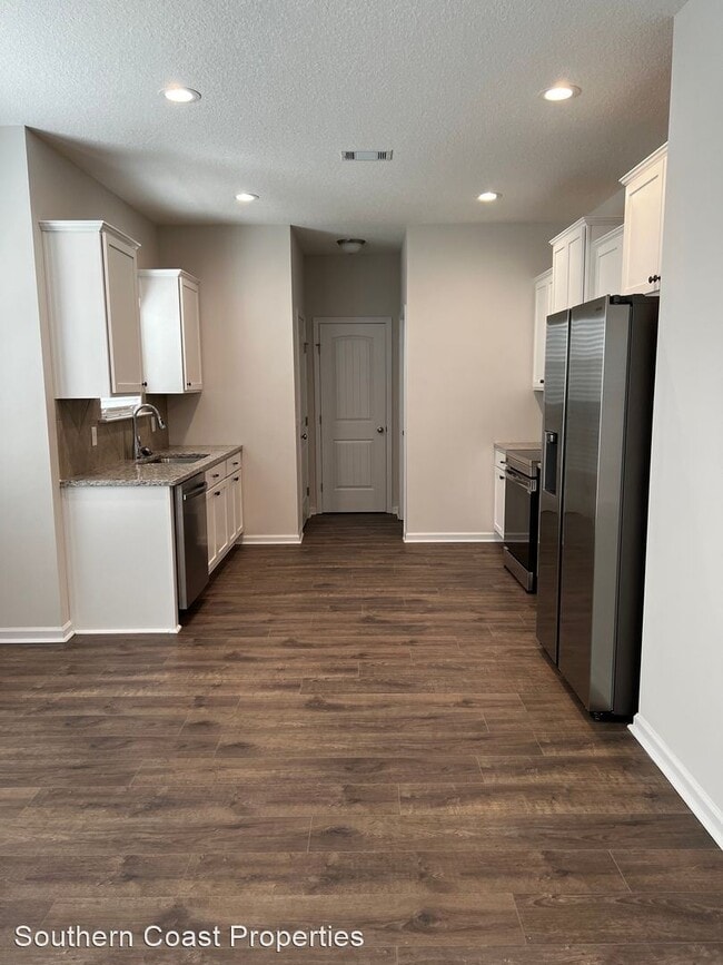 Building Photo - 4 br, 2.5 bath House - 305 Brightleaf Cir