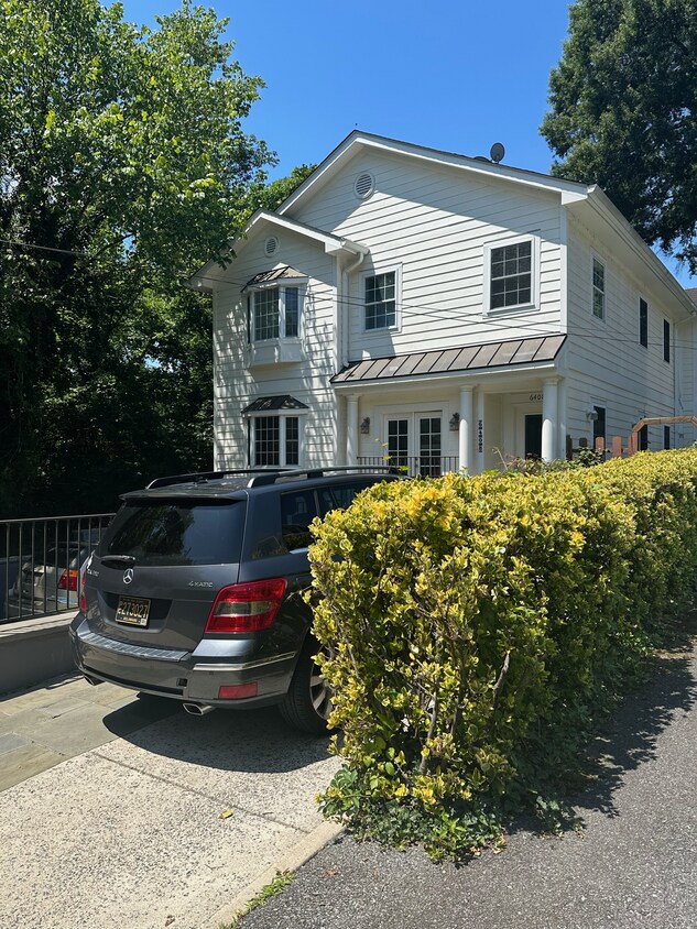 Three car drive with large two car garage - 6408 83rd St