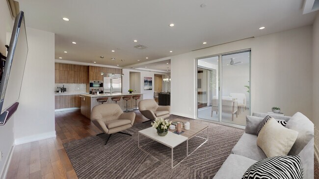 Virtually Staged Living Room/Kitchen - 460 N Palm Dr