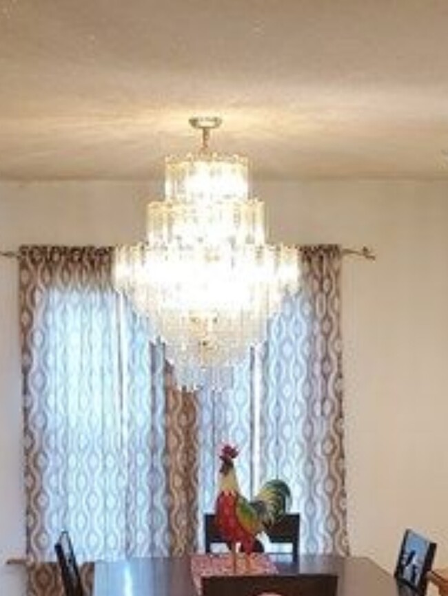 Dinning room. Chandelier has been replaced. - 11 Cypress St