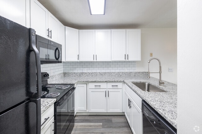 4BR, 2BA - 1,194SF - Kitchen - The Hills Northview Apartments