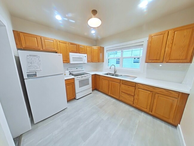 Foto del edificio - Adorable Apartment in Heart of Downtown Br...