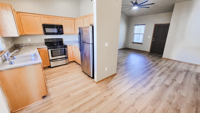 Main living area - living, dining, kitchen - 205 S Dewey Ave
