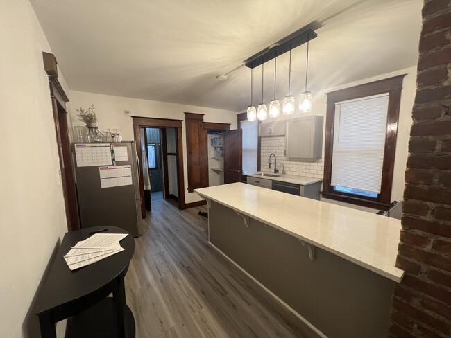 Another kitchen, with back porch open - 10 Oakwood St