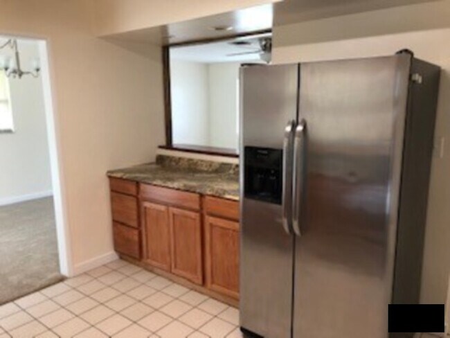 Photo - Large Corner Lot, Fenced in Yard, New Flooring, Fresh Paint, Lawn Care Included! House